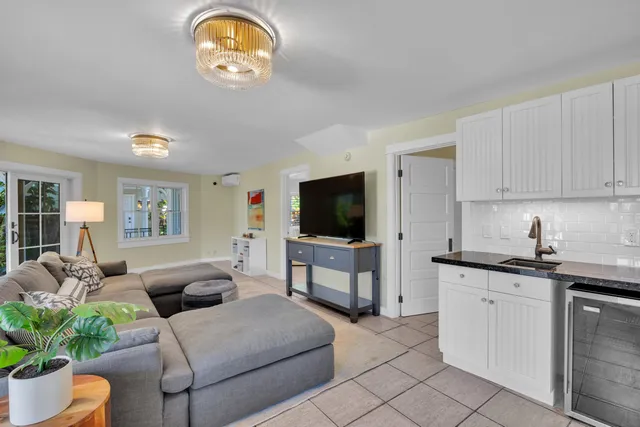 a living room with furniture and window
