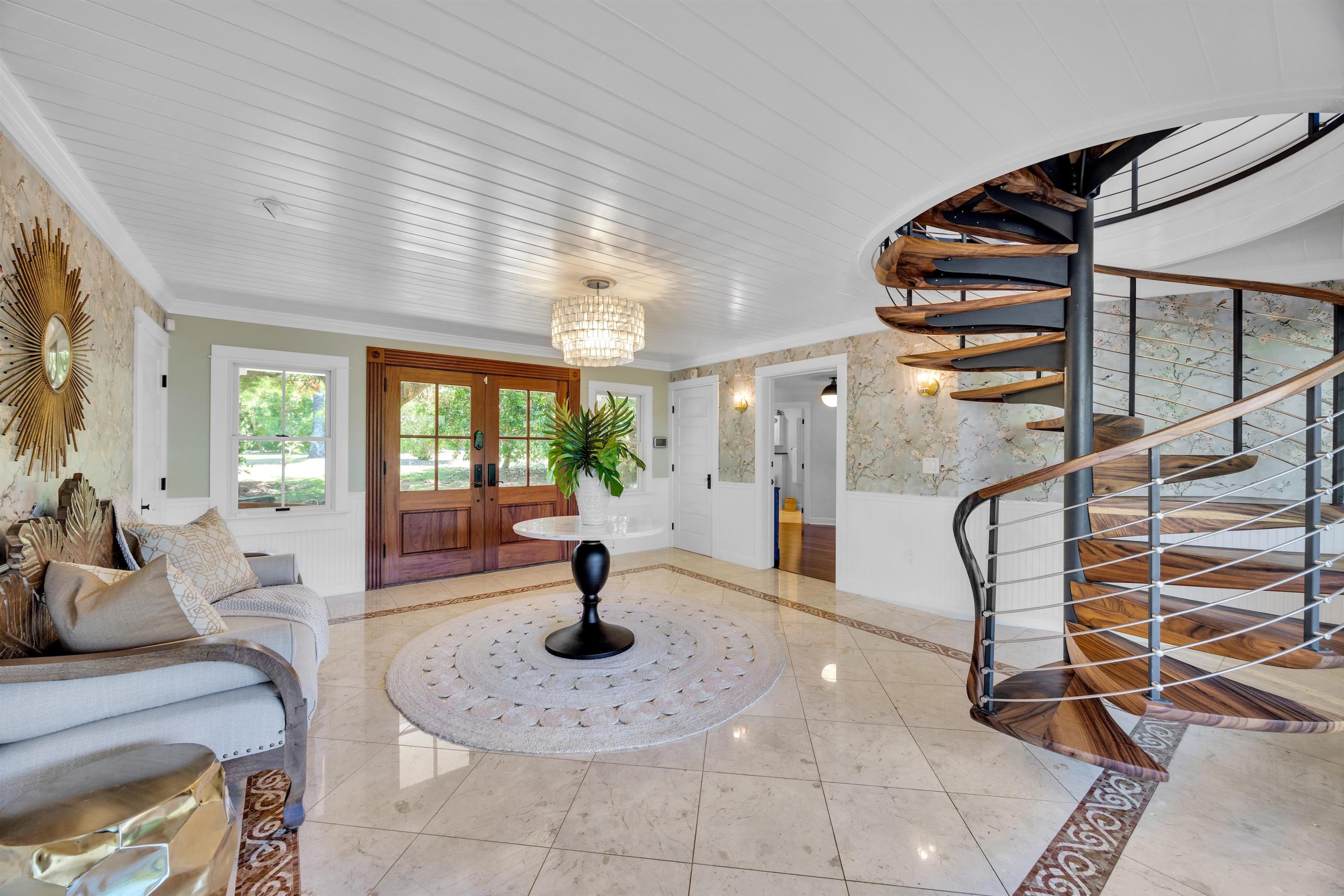 65 North Holokai Road Haiku, HI 96708 - Photo 3 of 50 a view of a livingroom with furniture and floor to ceiling window