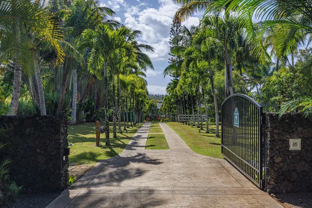 an aerial view of a houses with a yard