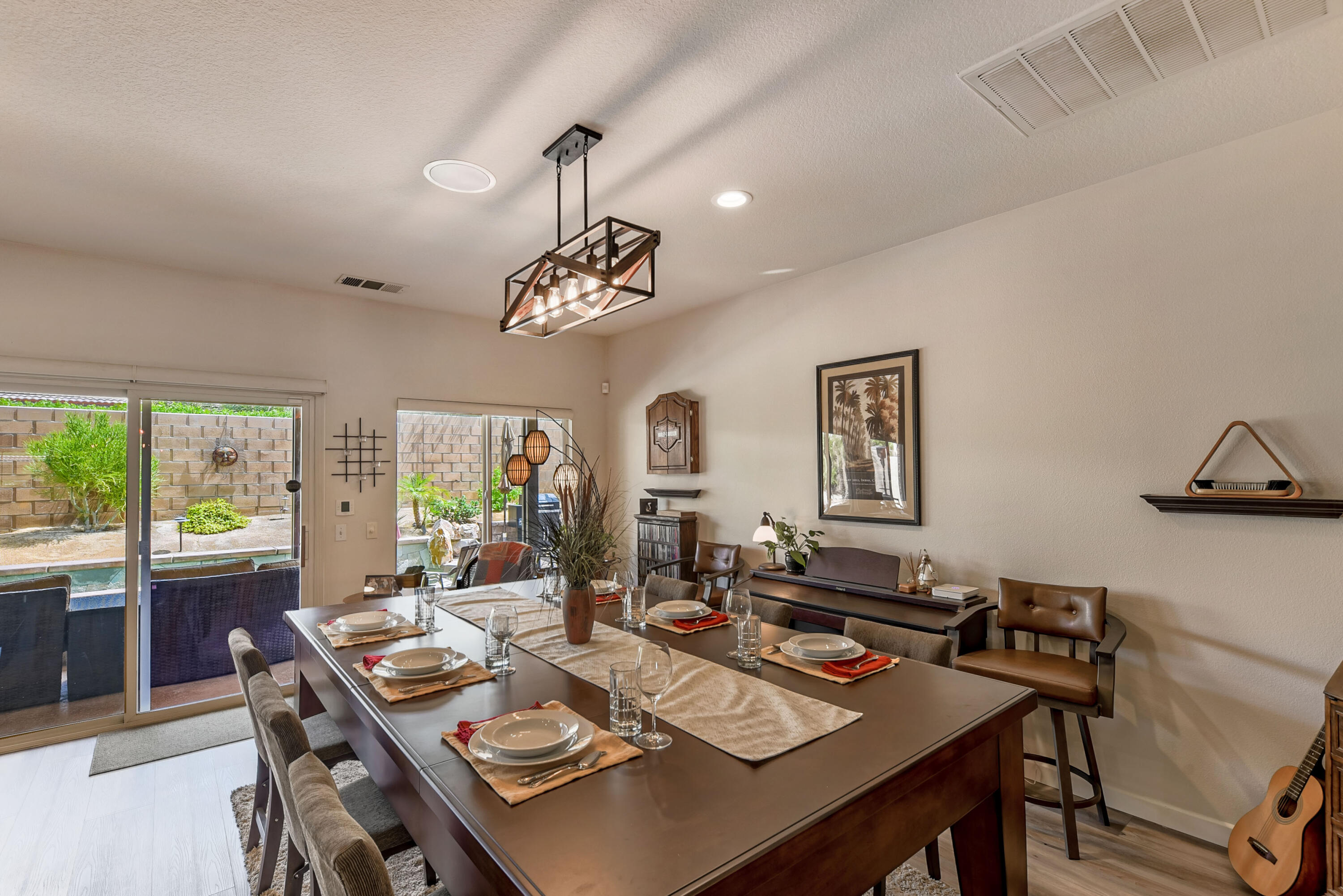 83164 Prairie Dunes Way Indio, CA 92203 - Photo 17 of 60 a view of a dining room with furniture window and outside view