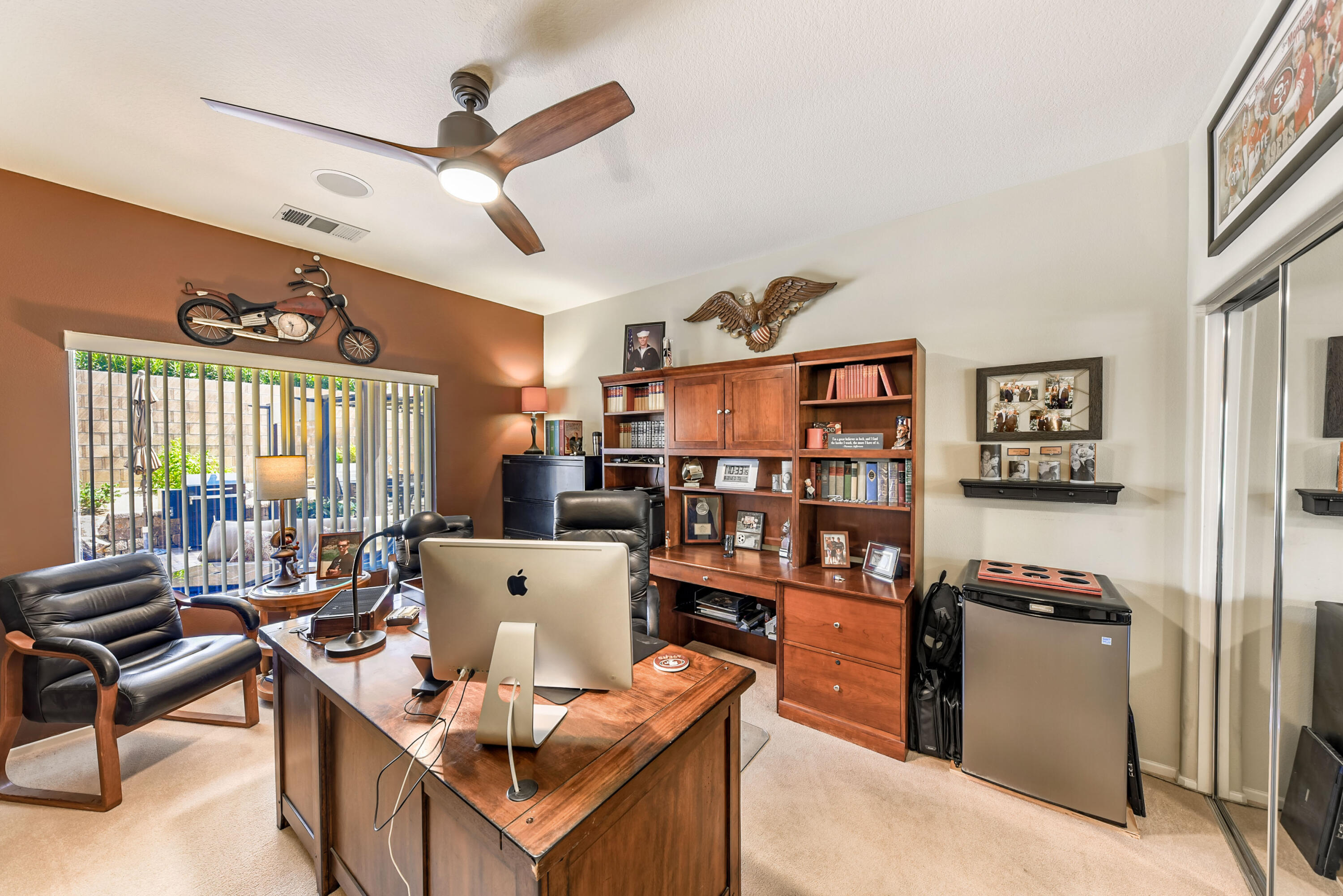 83164 Prairie Dunes Way Indio, CA 92203 - Photo 18 of 60 a living room with furniture kitchen view and a large window