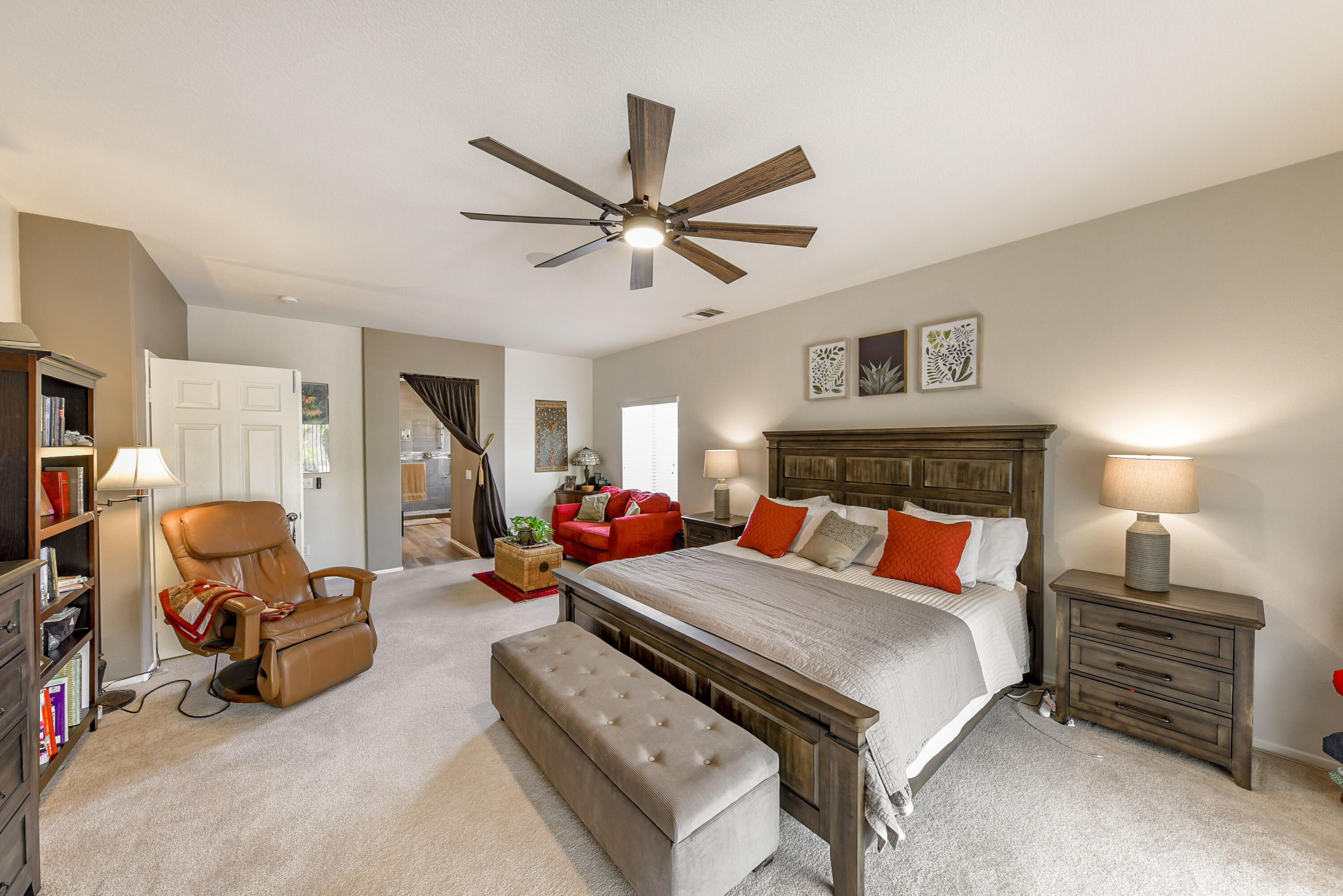 83164 Prairie Dunes Way Indio, CA 92203 - Photo 24 of 60 a bedroom with furniture a bed and a chandelier