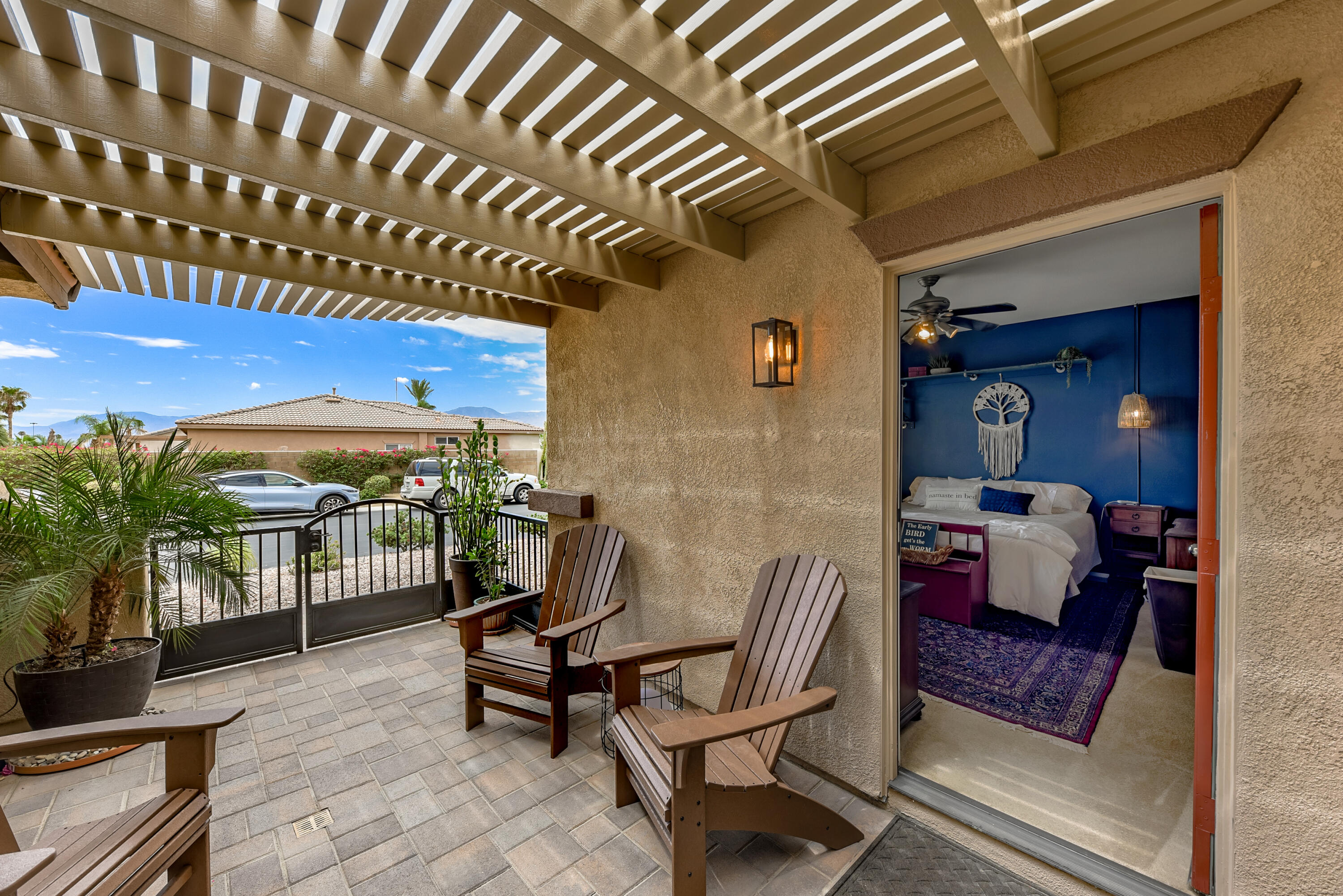 83164 Prairie Dunes Way Indio, CA 92203 - Photo 29 of 60 a view of a chairs and tables in patio