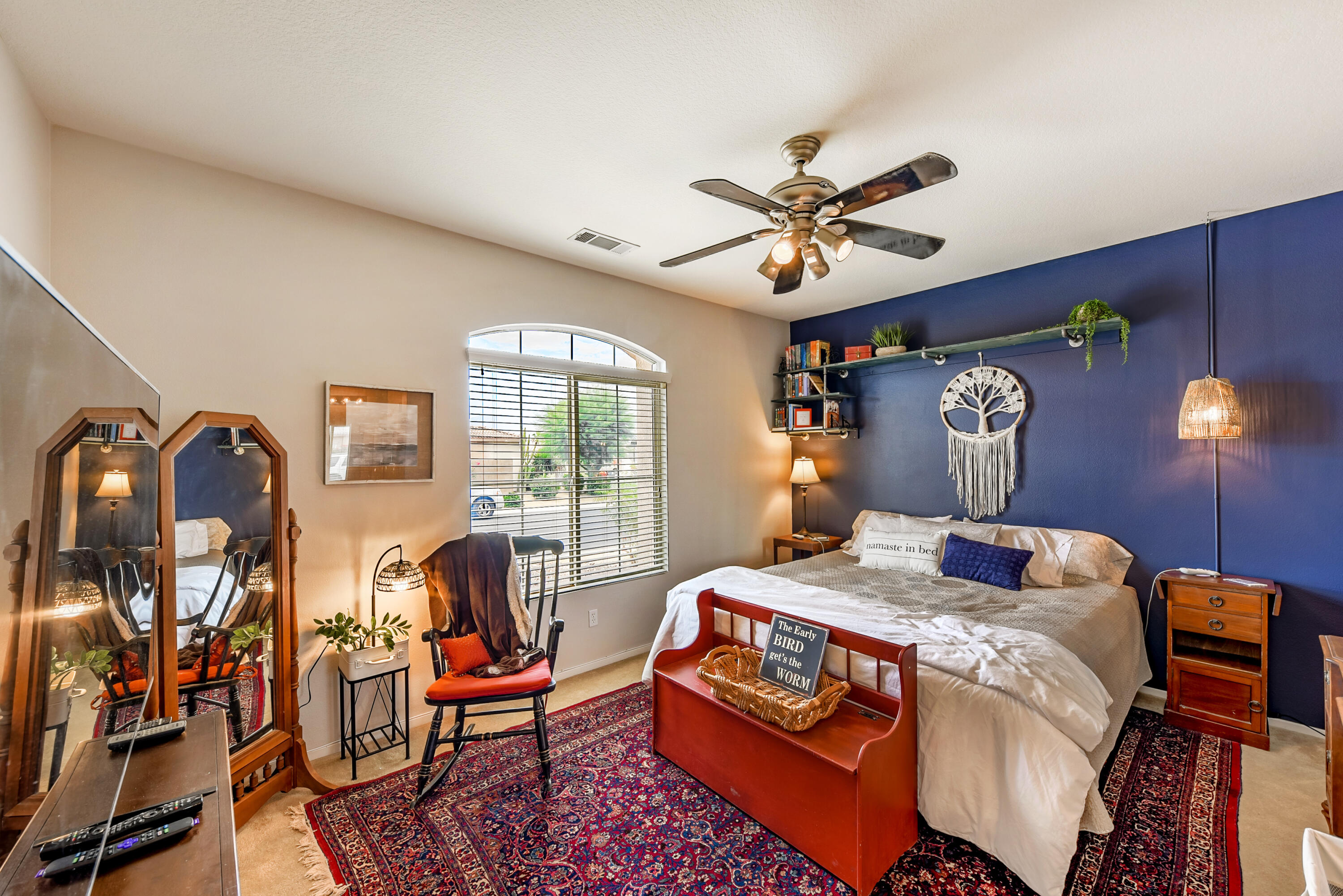 83164 Prairie Dunes Way Indio, CA 92203 - Photo 30 of 60 a bedroom with furniture and wooden floor