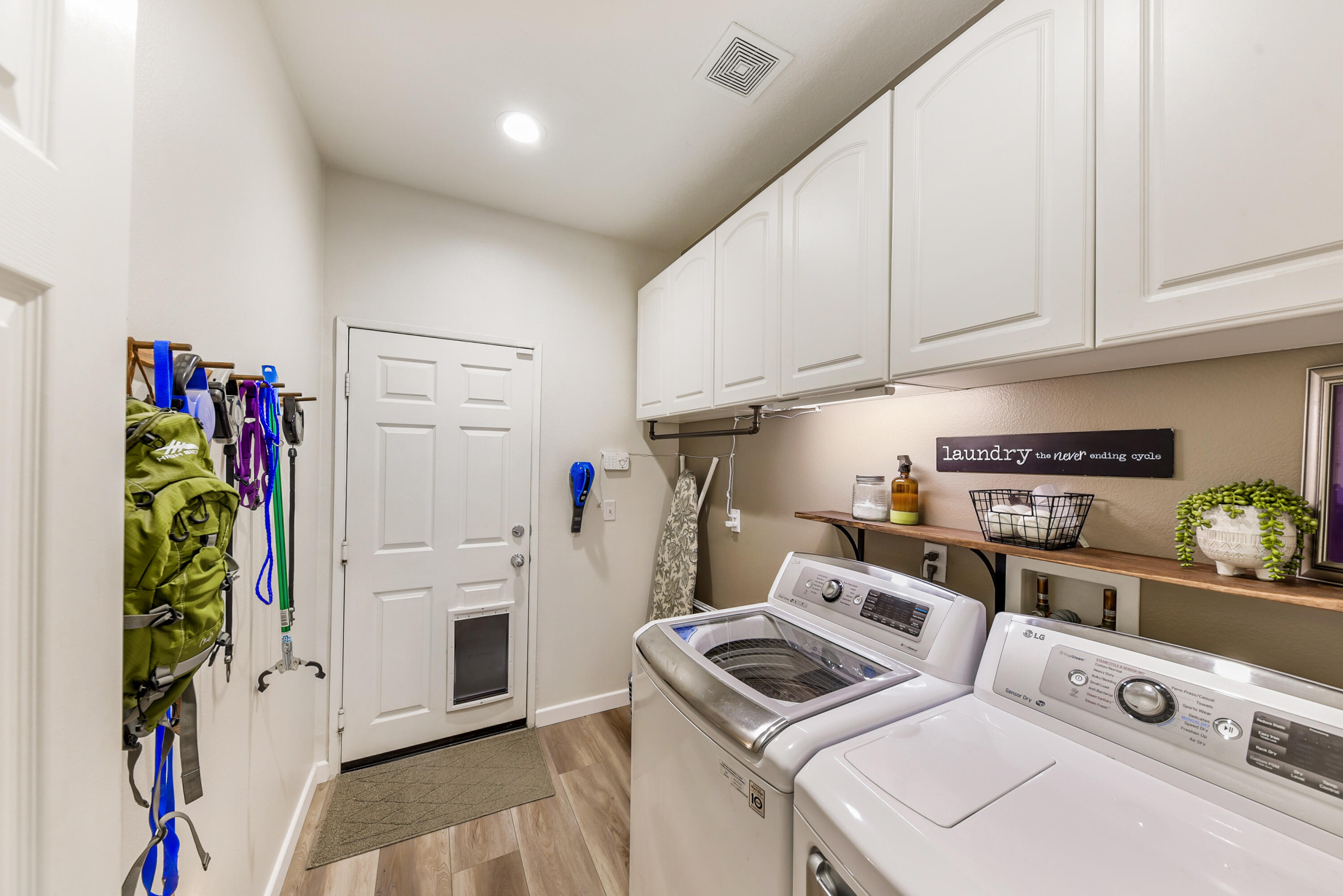 83164 Prairie Dunes Way Indio, CA 92203 - Photo 33 of 60 a kitchen with appliances cabinets and a counter top space