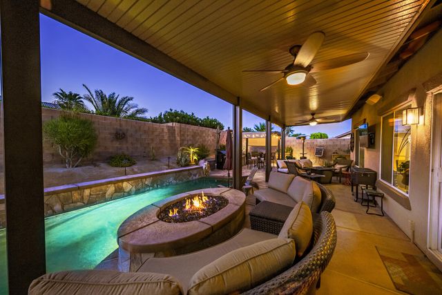 a view of outdoor sitting area with furniture