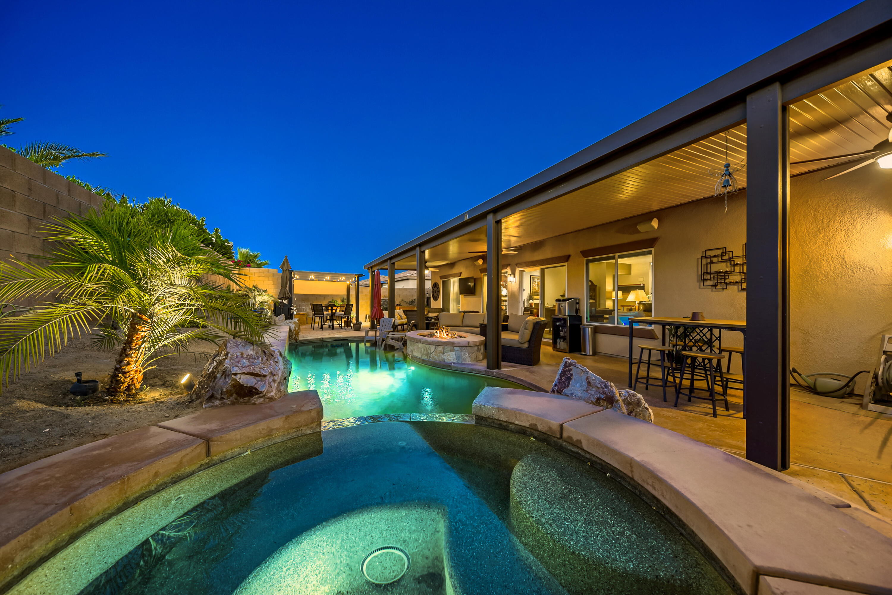 83164 Prairie Dunes Way Indio, CA 92203 - Photo 40 of 60 a view of a swimming pool with a patio