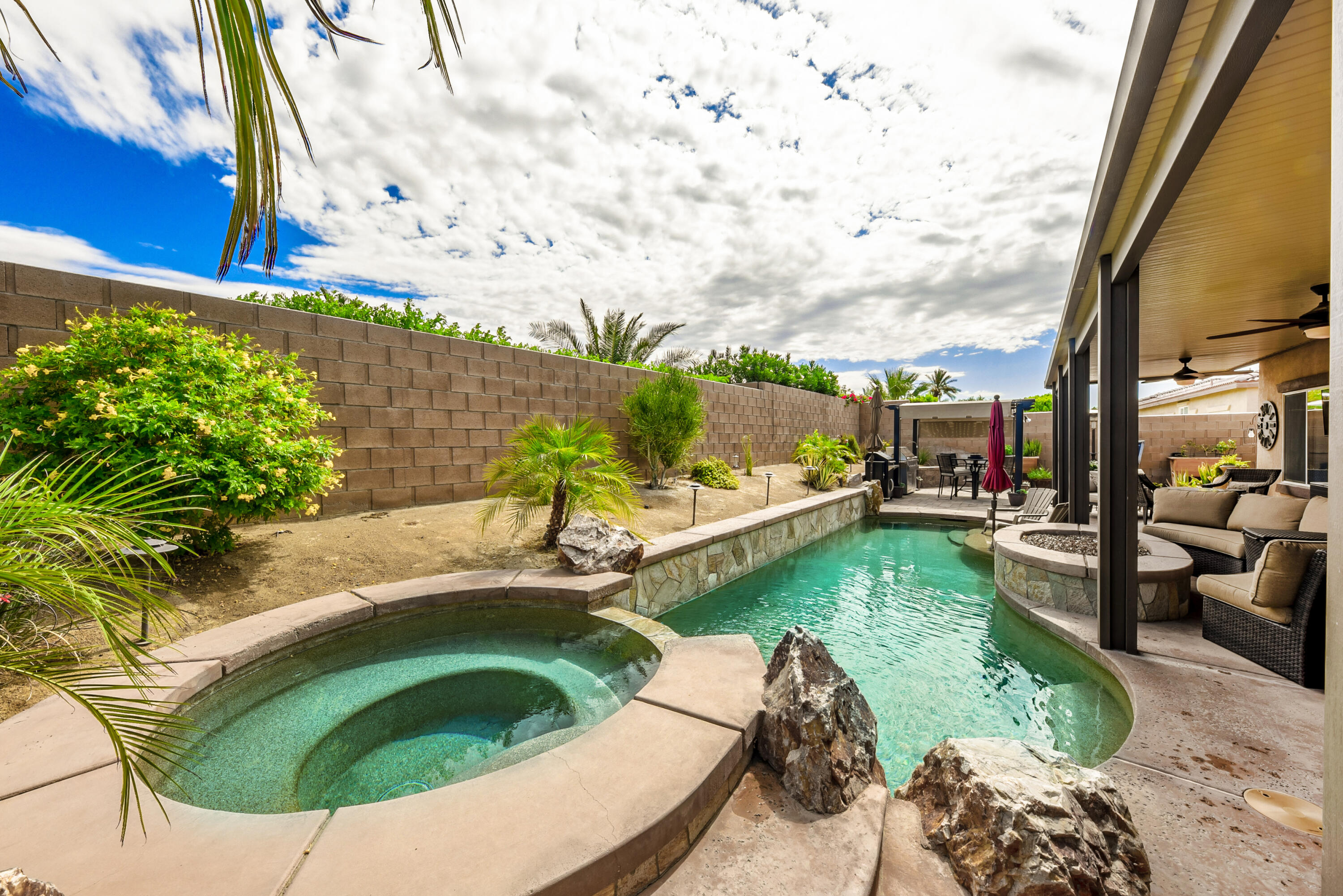 83164 Prairie Dunes Way Indio, CA 92203 - Photo 47 of 60 a view of a swimming pool with a patio