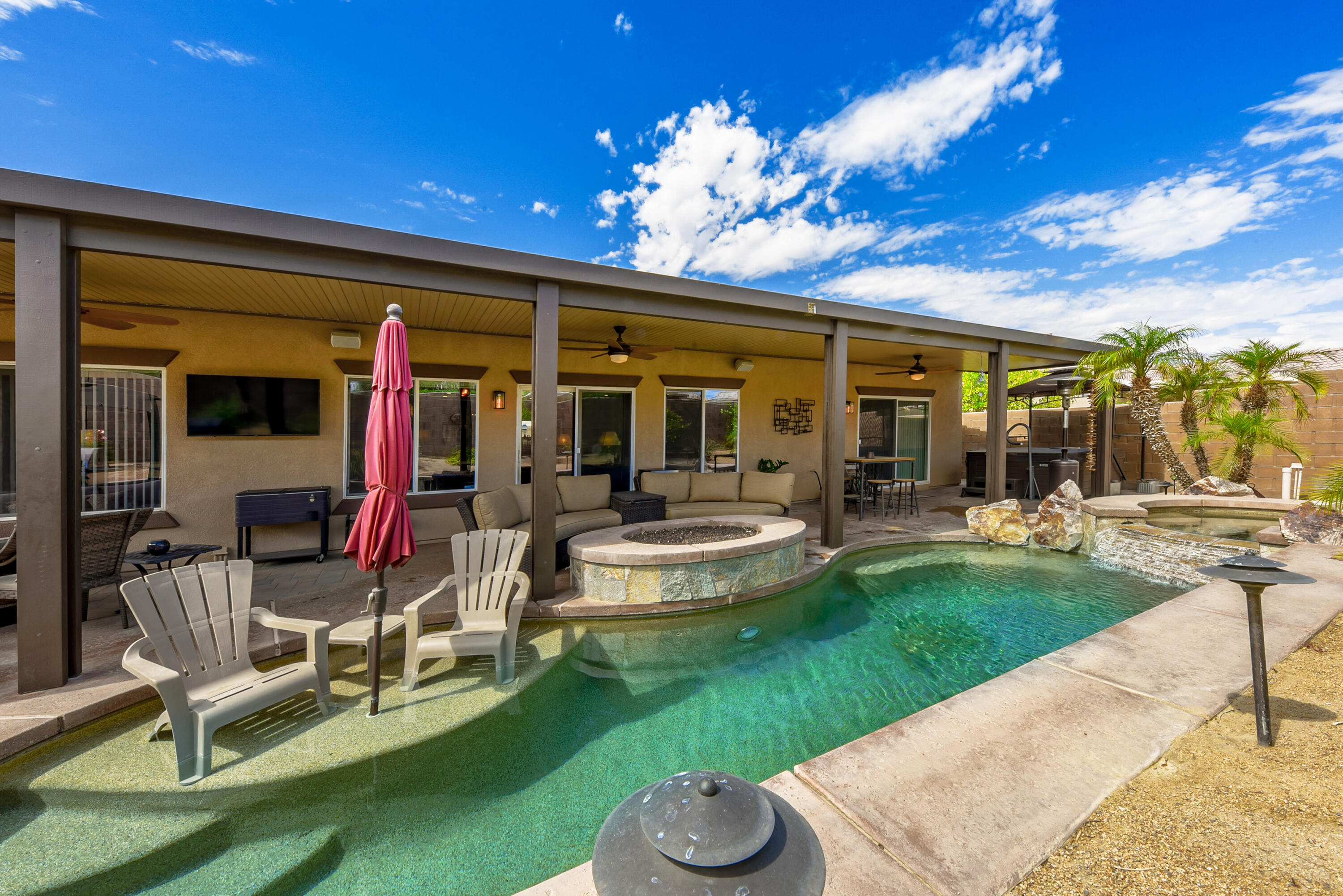 83164 Prairie Dunes Way Indio, CA 92203 - Photo 50 of 60 a view of a house with backyard porch and patio