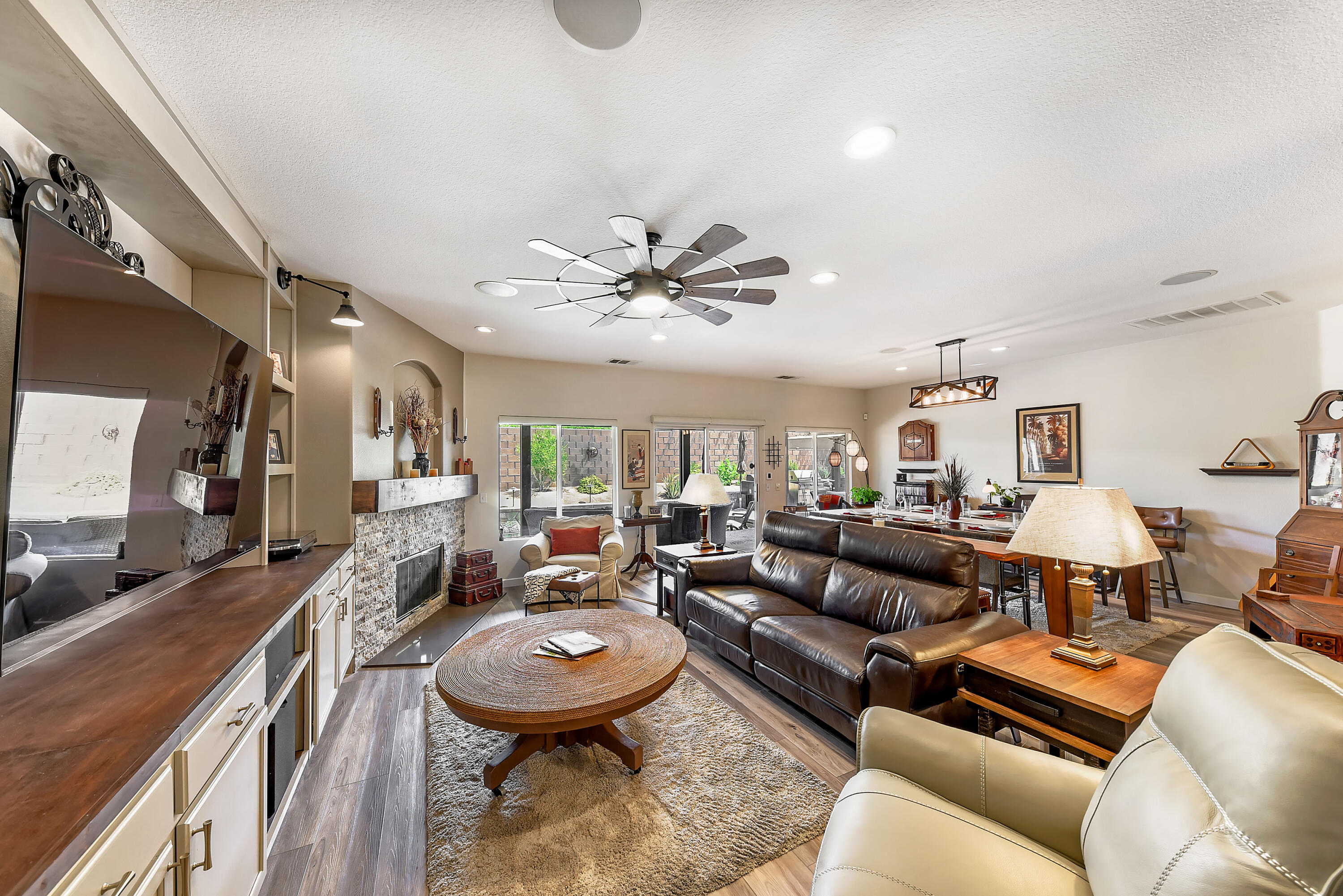83164 Prairie Dunes Way Indio, CA 92203 - Photo 9 of 60 a living room with furniture and a chandelier