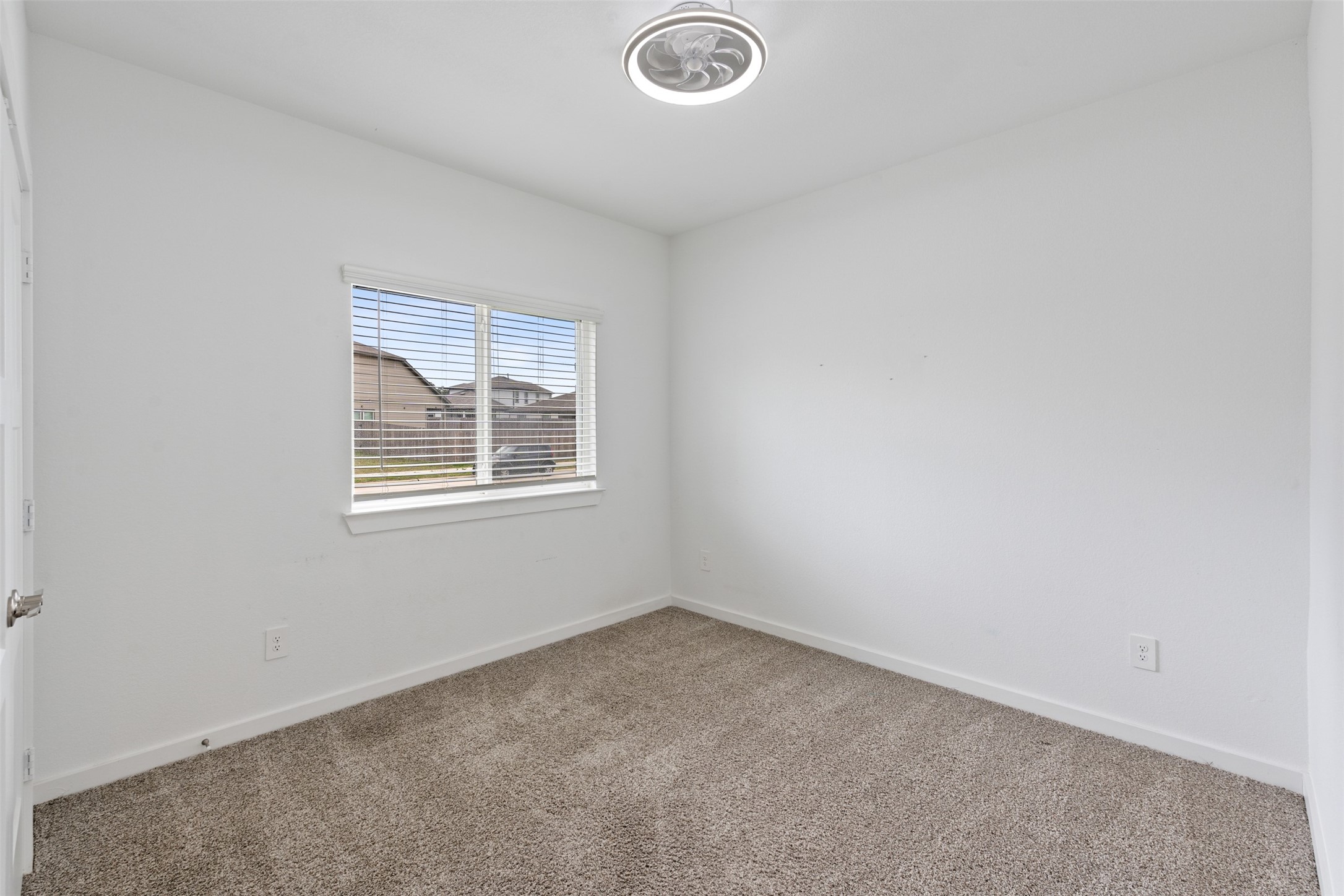 14379 Sweet Mdw Trail Conroe, TX 77384 - Photo 13 of 33 an empty room with windows