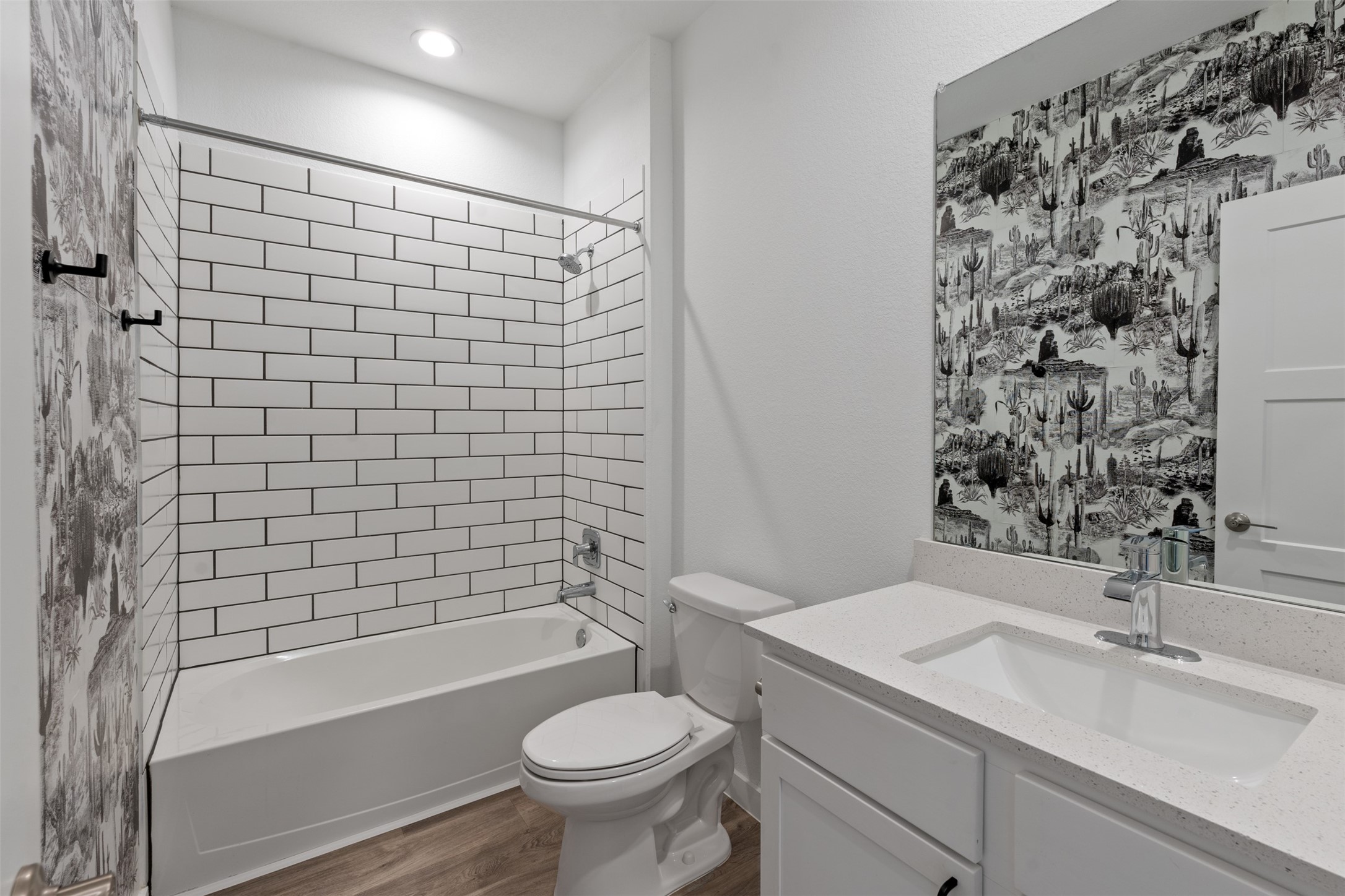 14379 Sweet Mdw Trail Conroe, TX 77384 - Photo 16 of 33 a bathroom with a sink toilet and shower