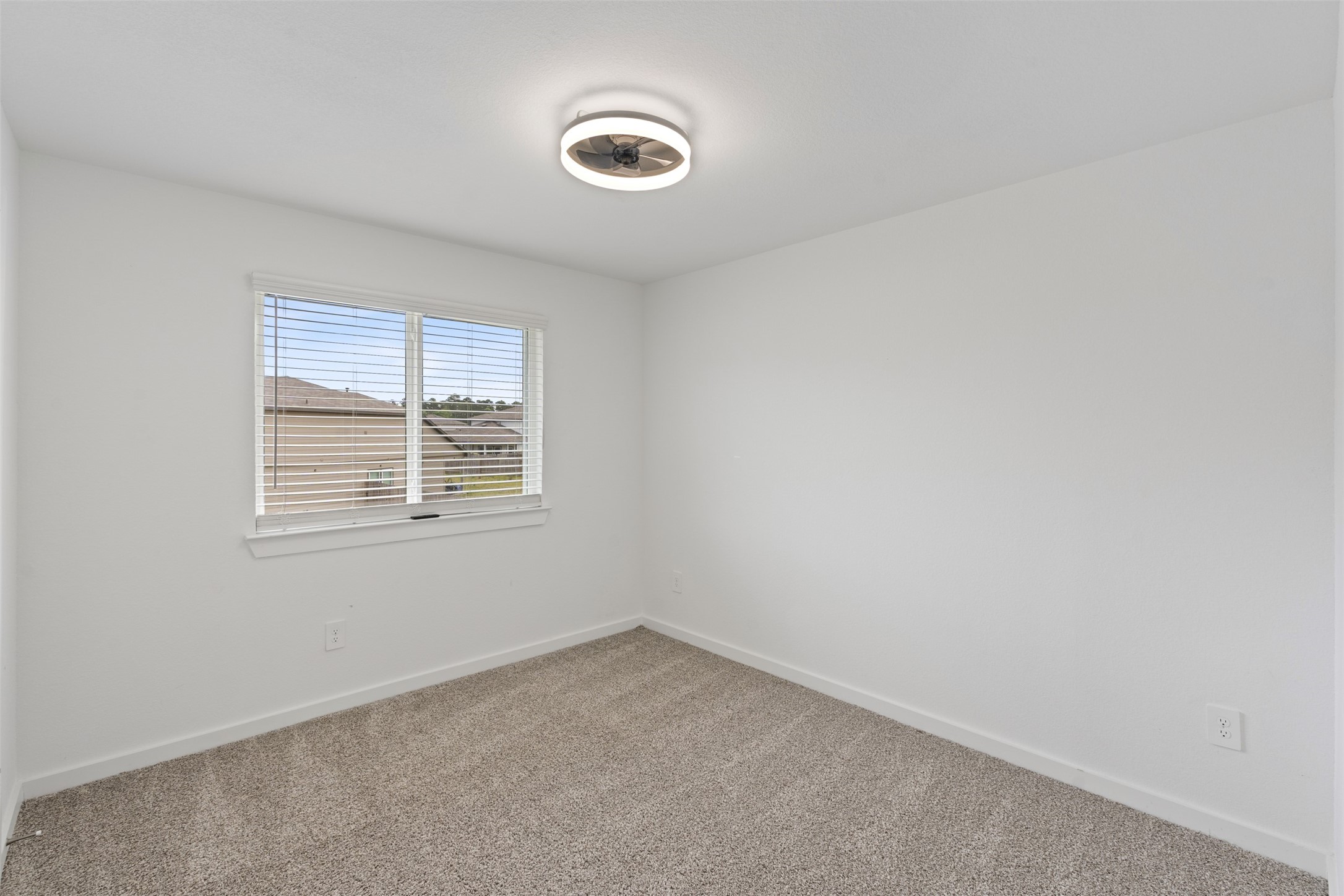 14379 Sweet Mdw Trail Conroe, TX 77384 - Photo 21 of 33 an empty room with a window