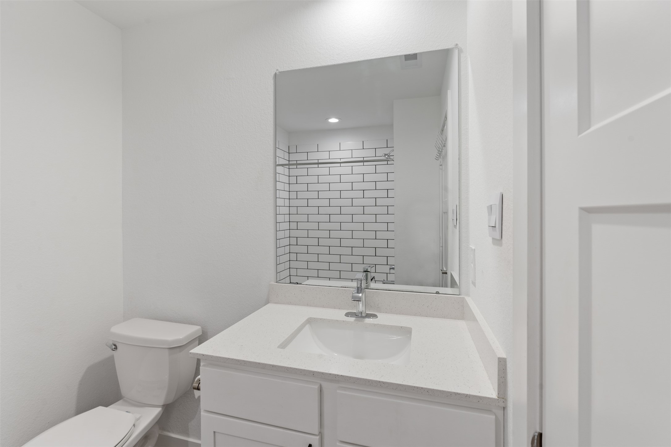 14379 Sweet Mdw Trail Conroe, TX 77384 - Photo 22 of 33 a bathroom with a sink a toilet and shower
