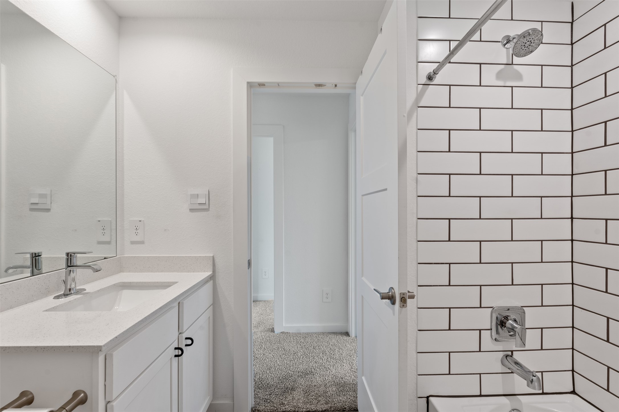 14379 Sweet Mdw Trail Conroe, TX 77384 - Photo 23 of 33 a bathroom with a sink and shower