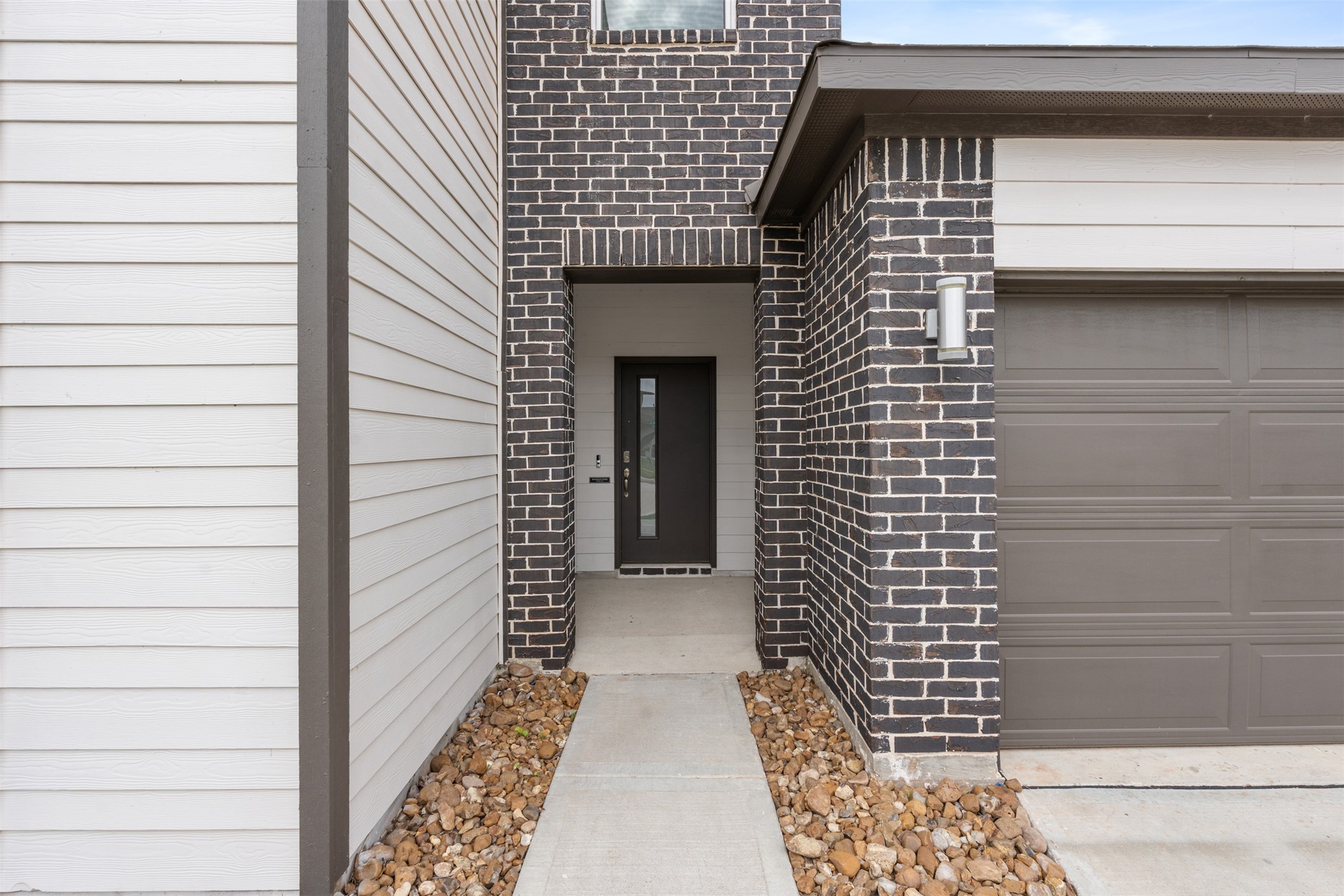 14379 Sweet Mdw Trail Conroe, TX 77384 - Photo 29 of 33 a view of a door of the house