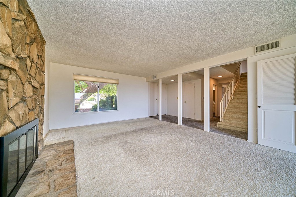 4963 Delacroix Road Rancho Palos Verdes, CA 90275 - Photo 6 of 26 Fireplace anchors the home as you walk through the front door.