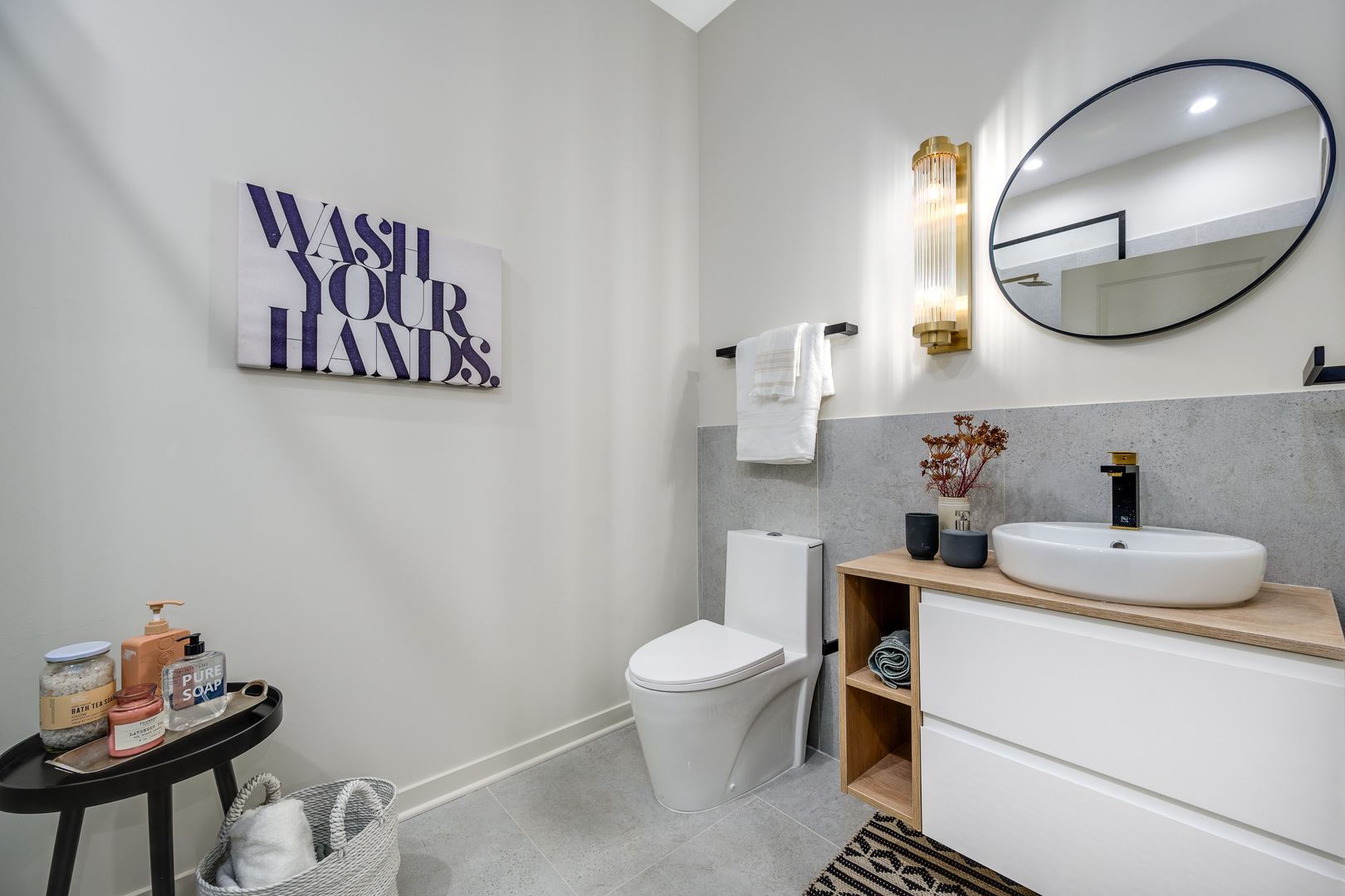 11 West Prospect Avenue, Unit 217 Mount Prospect, IL 60056 - Photo 13 of 66 a bathroom with a toilet sink vanity mirror and vanity