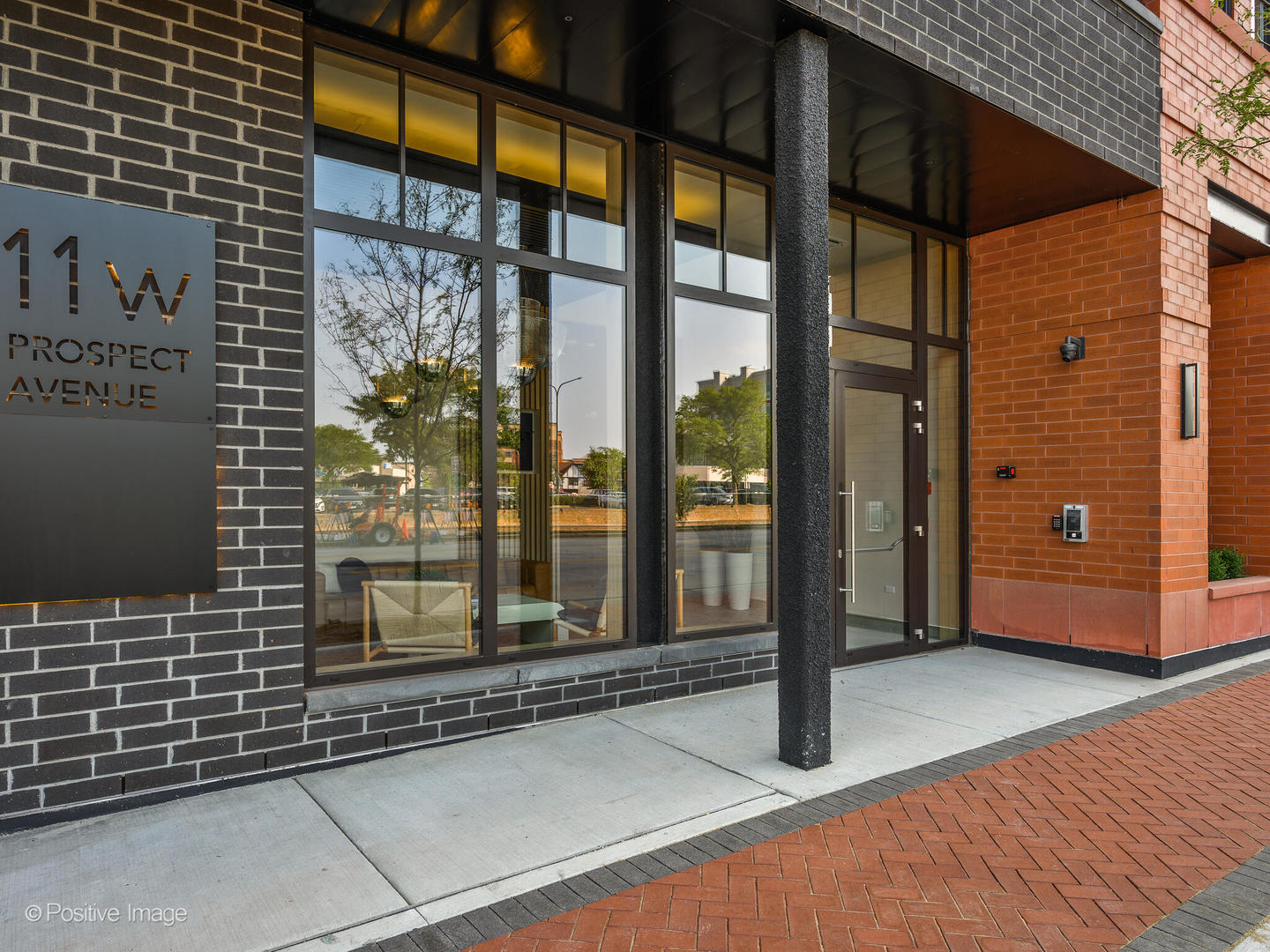 11 West Prospect Avenue, Unit 217 Mount Prospect, IL 60056 - Photo 2 of 66 a outdoor space with sliding door and wooden floor