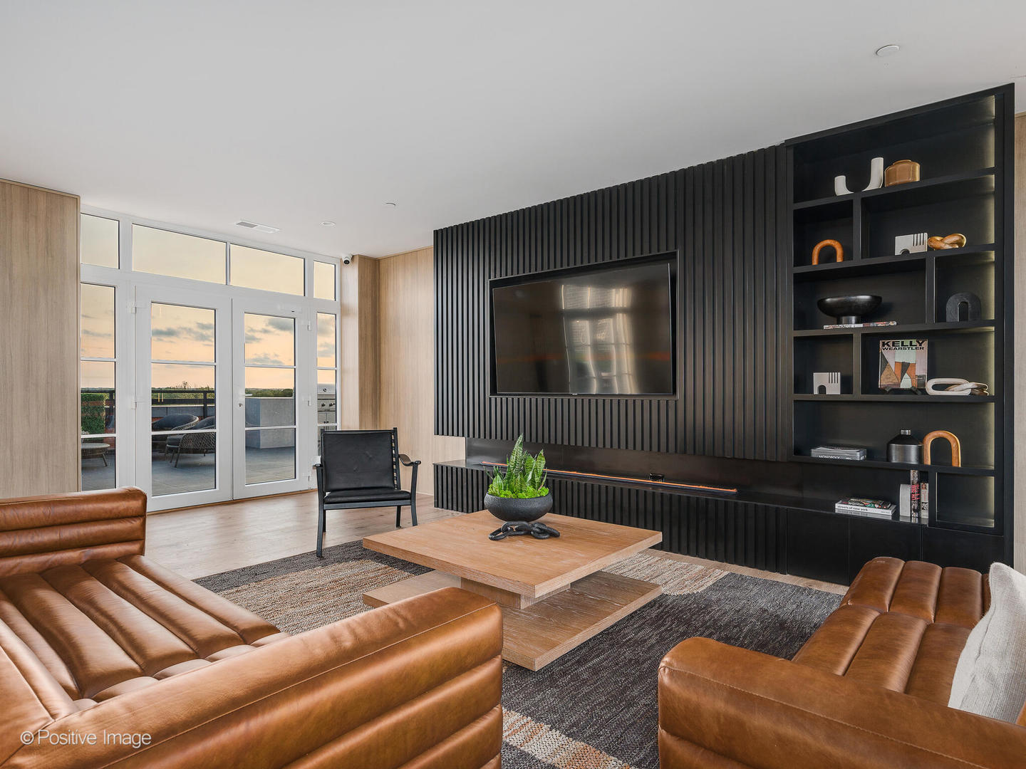 11 West Prospect Avenue, Unit 217 Mount Prospect, IL 60056 - Photo 41 of 66 a living room with furniture and floor to ceiling window