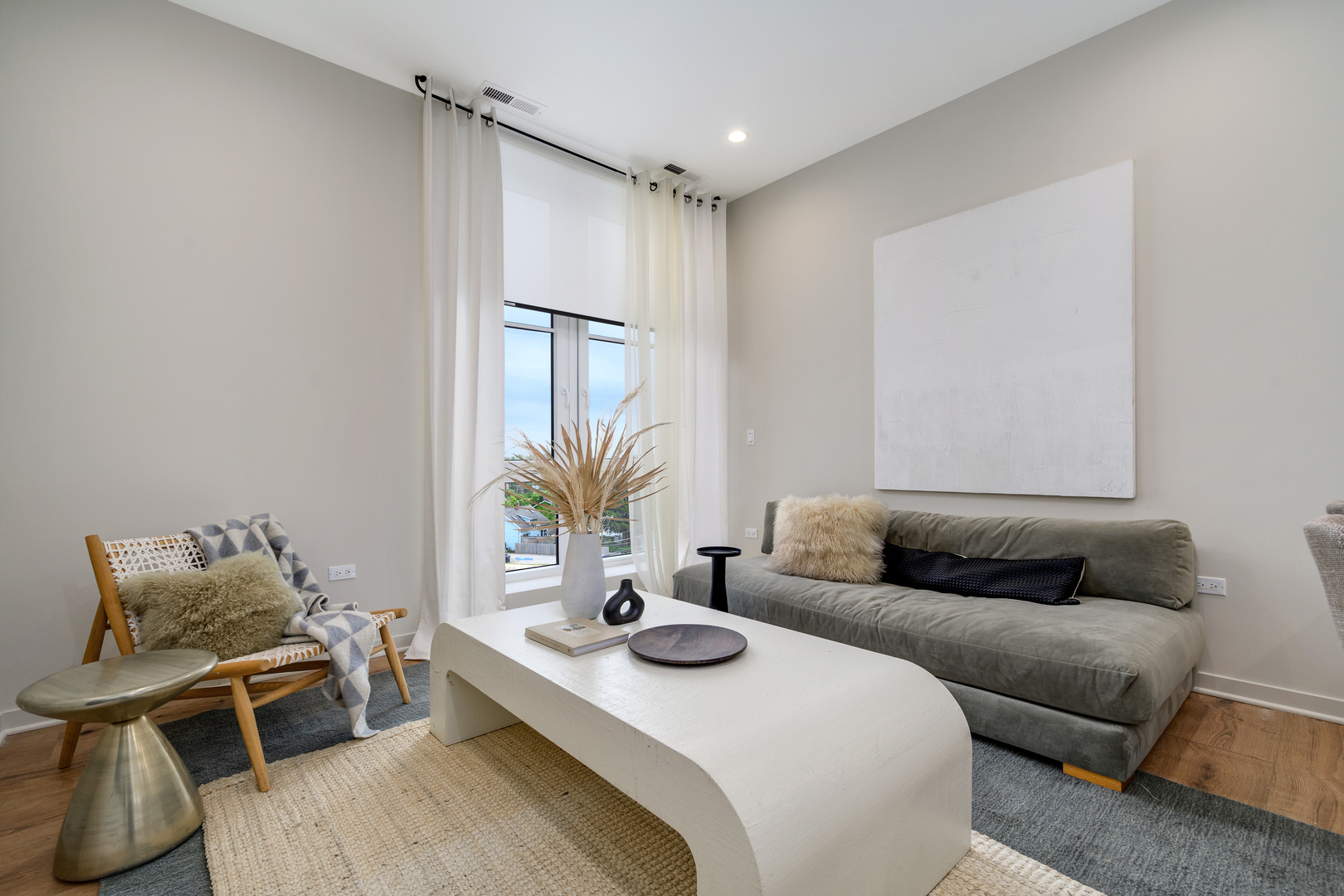 11 West Prospect Avenue, Unit 217 Mount Prospect, IL 60056 - Photo 7 of 66 a living room with furniture and wooden floor