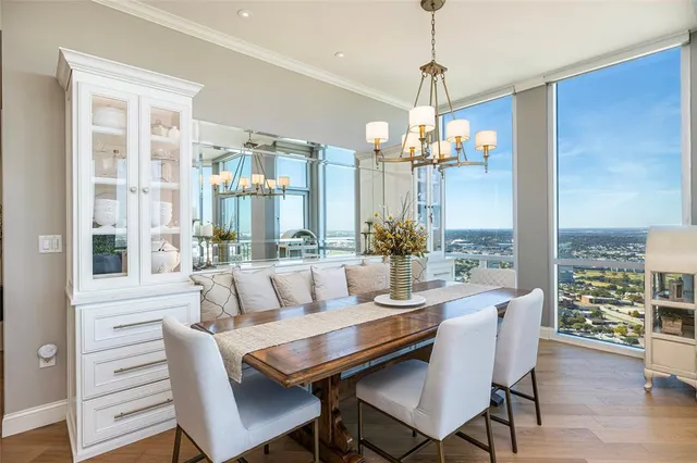 a kitchen with a sink appliances and cabinets