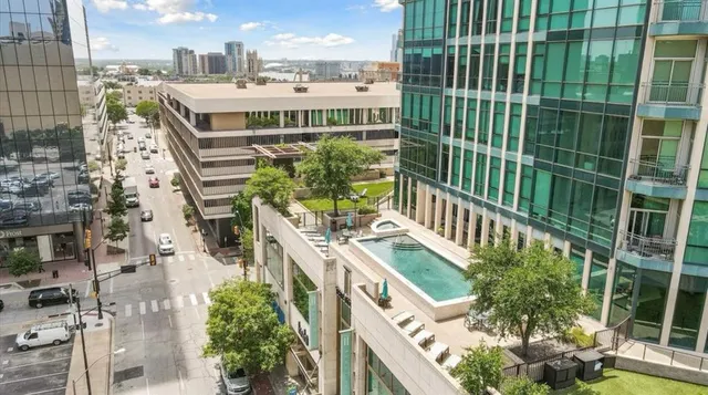 a view of swimming pool with outdoor seating