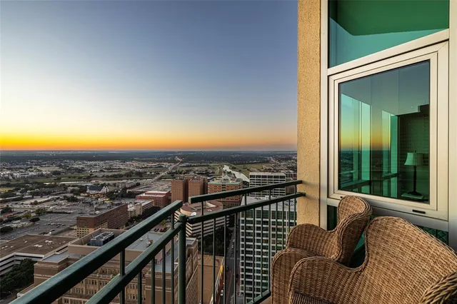 a view of a balcony with an ocean view