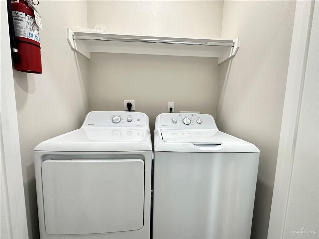 1011 Starr Street Mercedes, TX 78570 - Photo 22 of 35 a utility room with dryer and washer