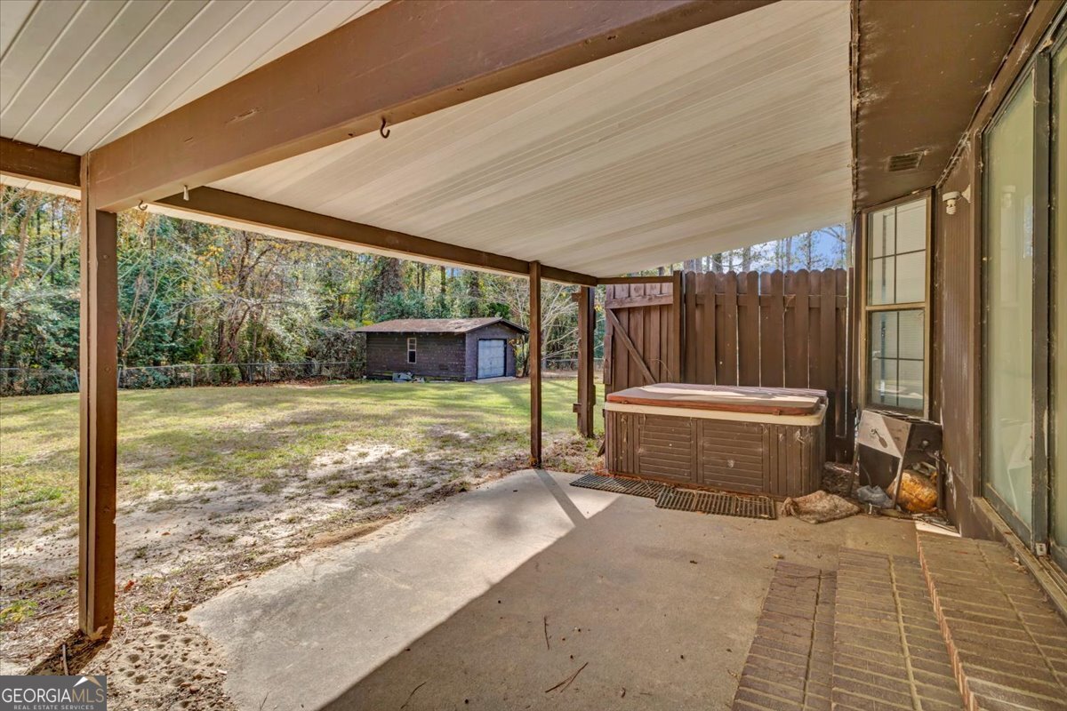 1702 Vada Road Bainbridge, GA 39817 - Photo 21 of 33 a view of a backyard of the house