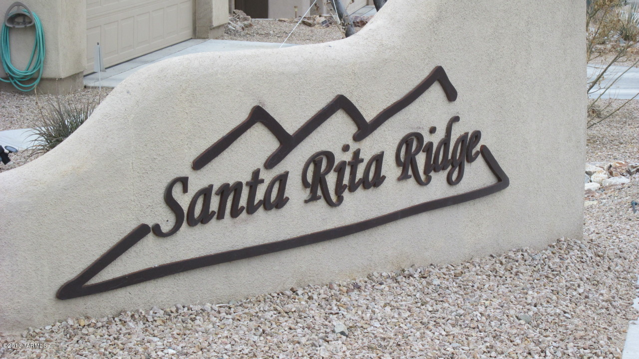 10855 East New Rock Ridge Drive Vail, AZ 85641 - Photo 34 of 34 a close up of a street sign