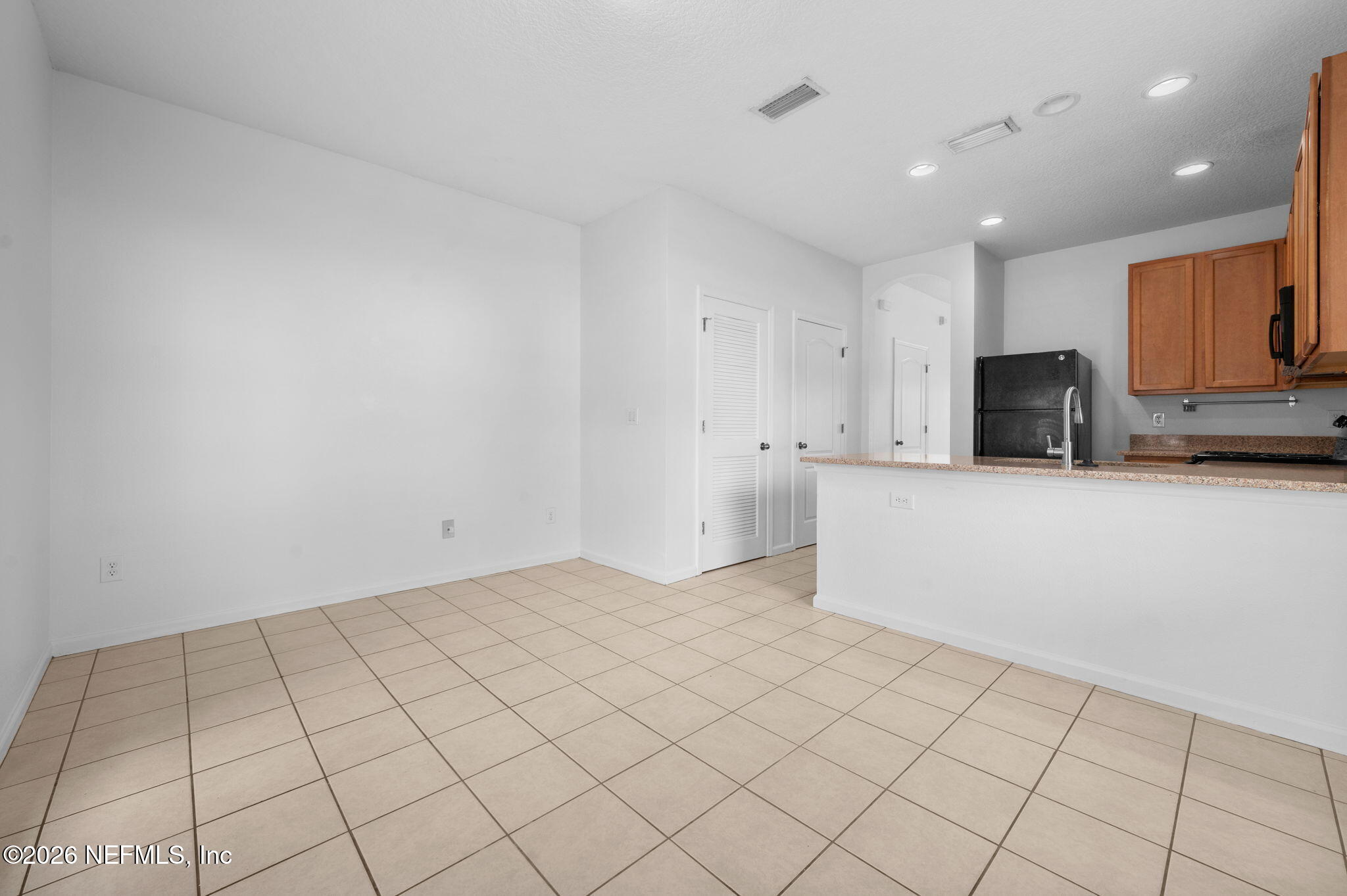 253 Syrah Way St. Augustine, FL 32084 - Photo 8 of 39 a view of a kitchen with a sink