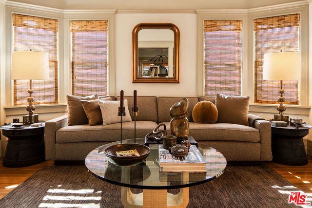 a kitchen with stainless steel appliances granite countertop a refrigerator and a stove