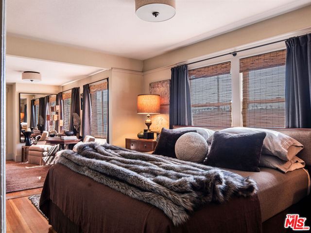 a living room with furniture fireplace and a flat screen tv