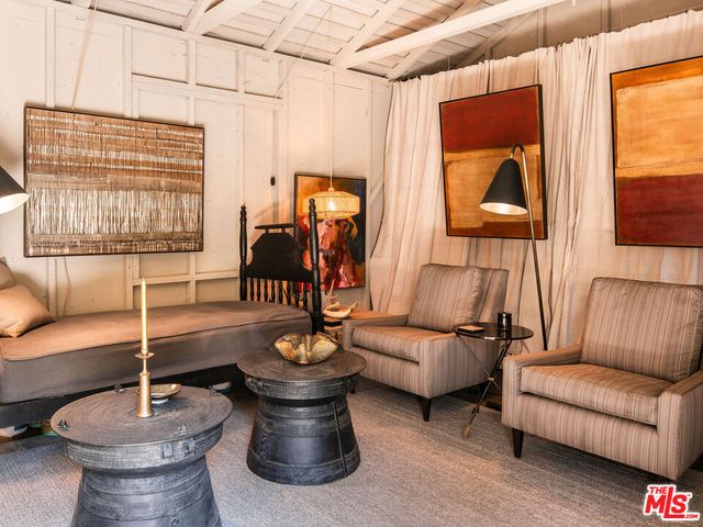 a outdoor living space with patio furniture and a potted plant