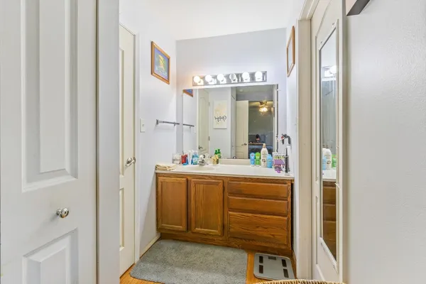 a room with a mirror and a sink