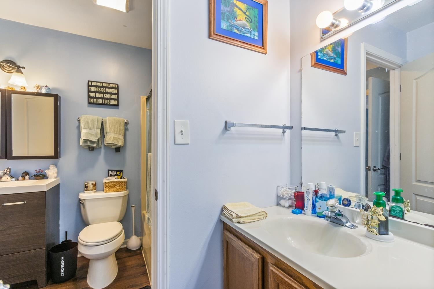 216 Pardridge Place DeKalb, IL 60115 - Photo 16 of 18 a bathroom with a sink toilet and mirror