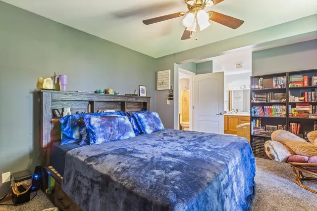 a bed room with a bed and a couch