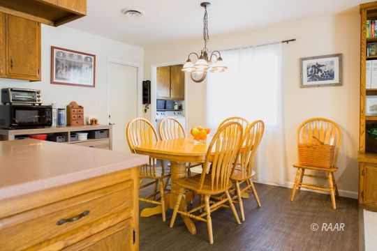 600 Las Posas Street Ridgecrest, CA 93555 - Photo 15 of 35 a view of a dining room with furniture and wooden floor