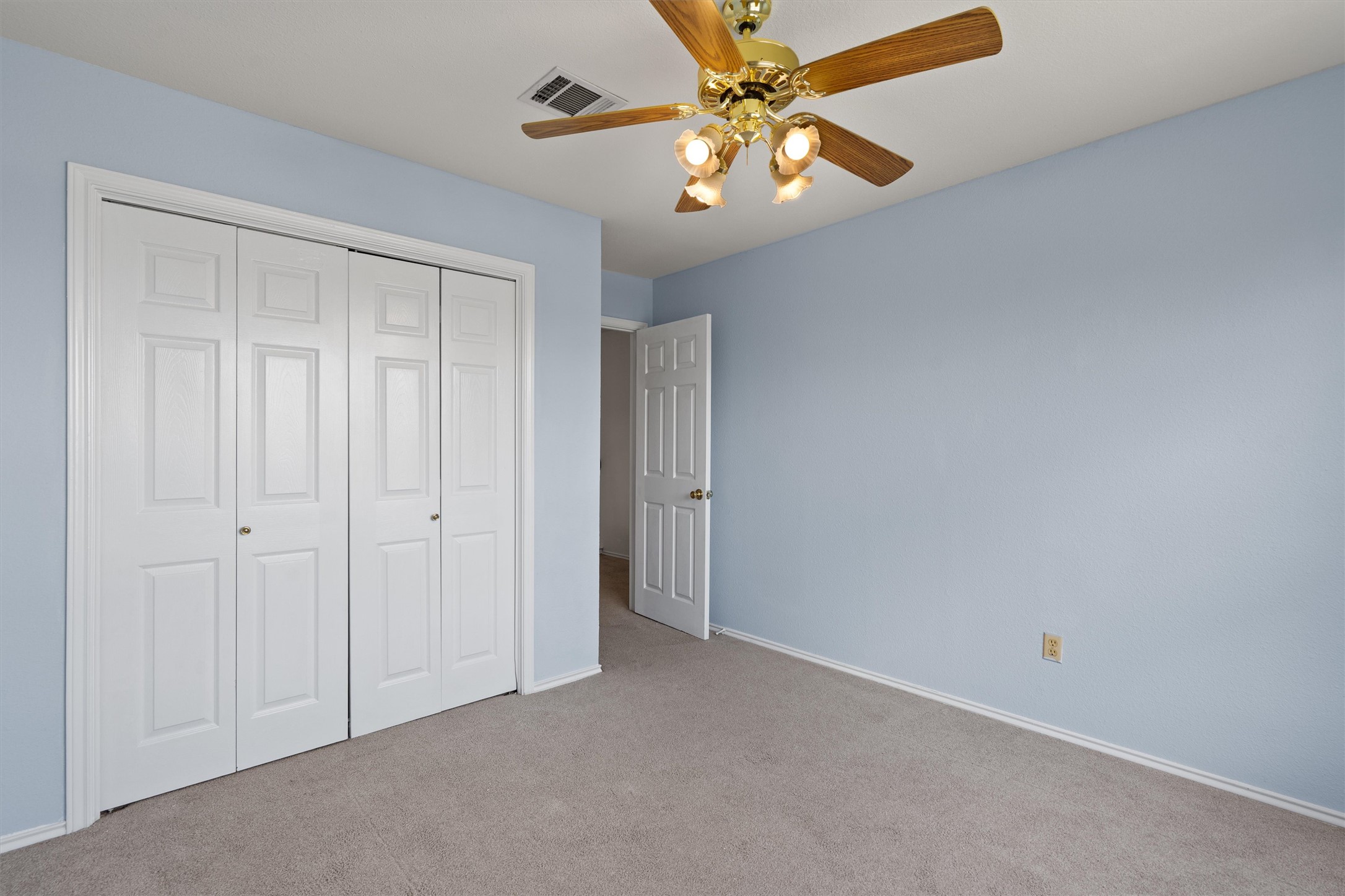 100 Parque Circle Georgetown, TX 78626 - Photo 30 of 39 an empty room with closet and fan