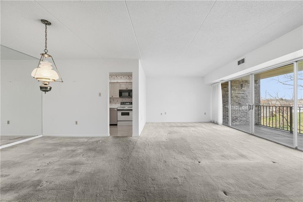 2160 Greentree Road, Unit 705W Pittsburgh, PA 15220 - Photo 7 of 32 a view of an empty room with a window