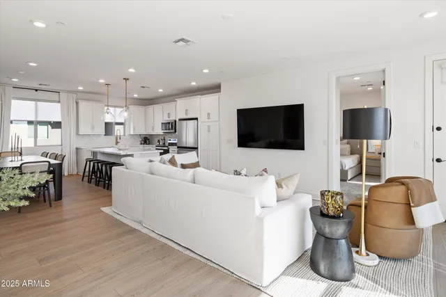 a living room with furniture and a couch