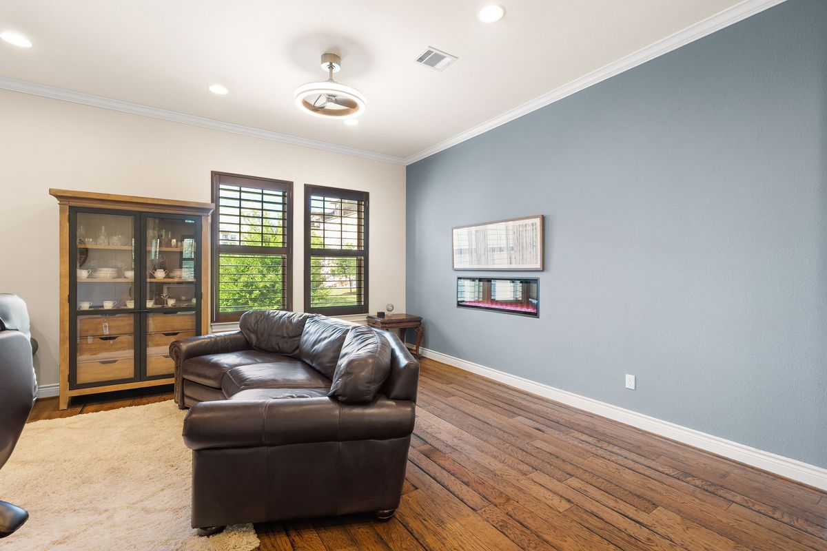 1116 Highknoll Lane Georgetown, TX 78628 - Photo 13 of 36 a living room with furniture and a large window