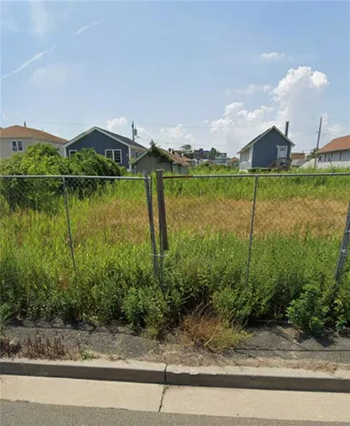 a view of a lake with a garden