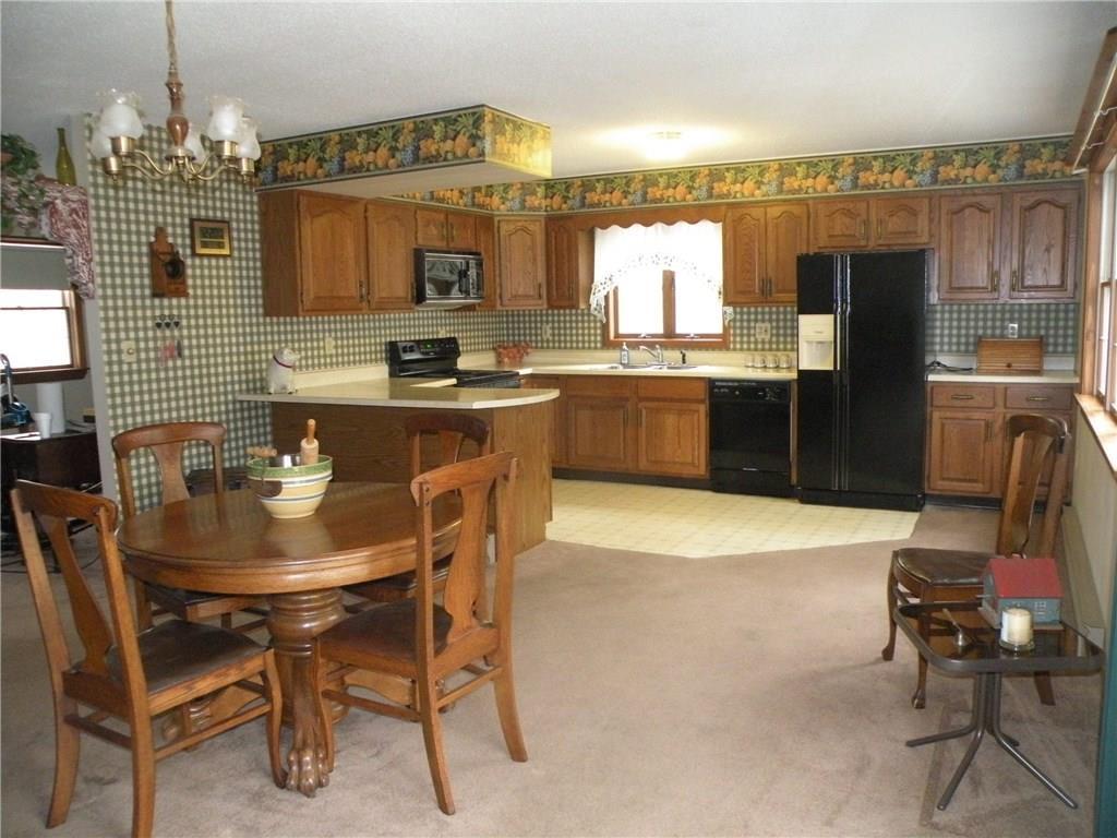129 Castle Island Road Belgrade, ME 04917 - Photo 7 of 29 KITCHEN VIEW FROM FRENCH DOORS TO DECK