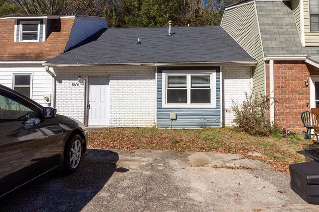 a house view with a backyard space