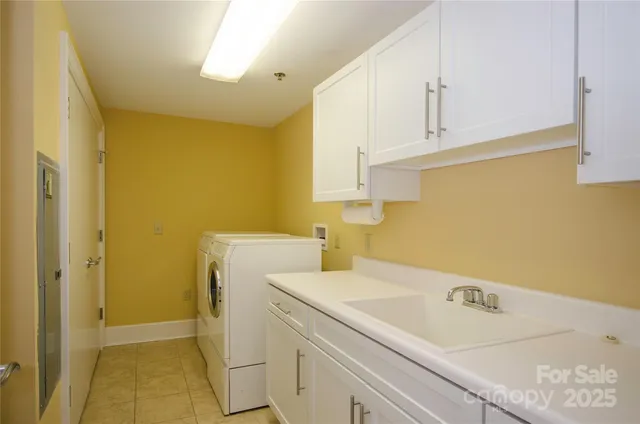 a view of utility room with washer and dryer
