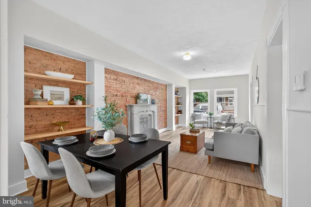 a kitchen with a sink stove and microwave