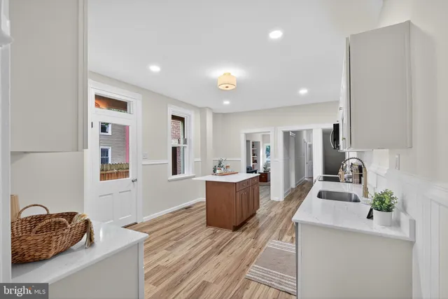 a view of a livingroom with wooden floor
