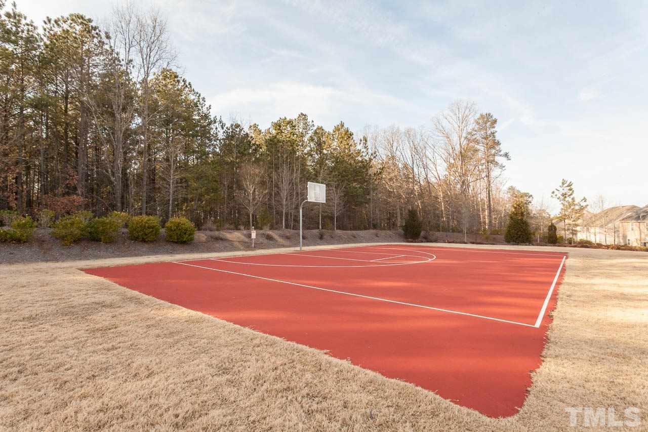 2930 Casona Way Raleigh, NC 27616 - Photo 24 of 25 a view of a tennis court